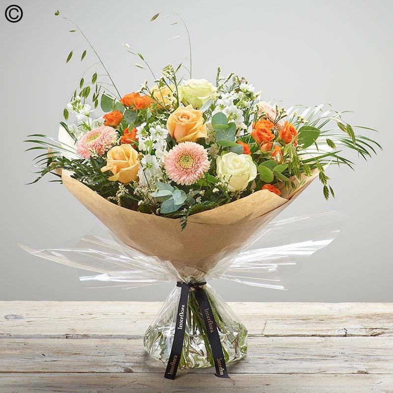 Lily free hand tied bouquet made with the finest flowers.