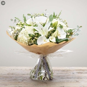 Sympathy hand tied made with the finest flowers.